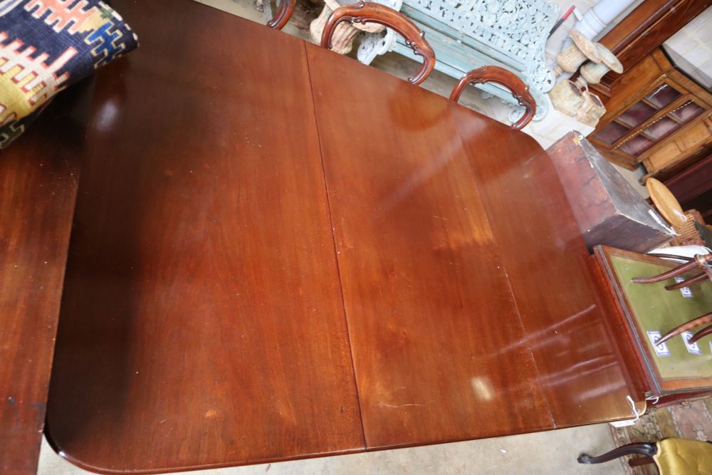 A George III style mahogany drop leaf dining table, 176cm extended width 119cm height 76cm